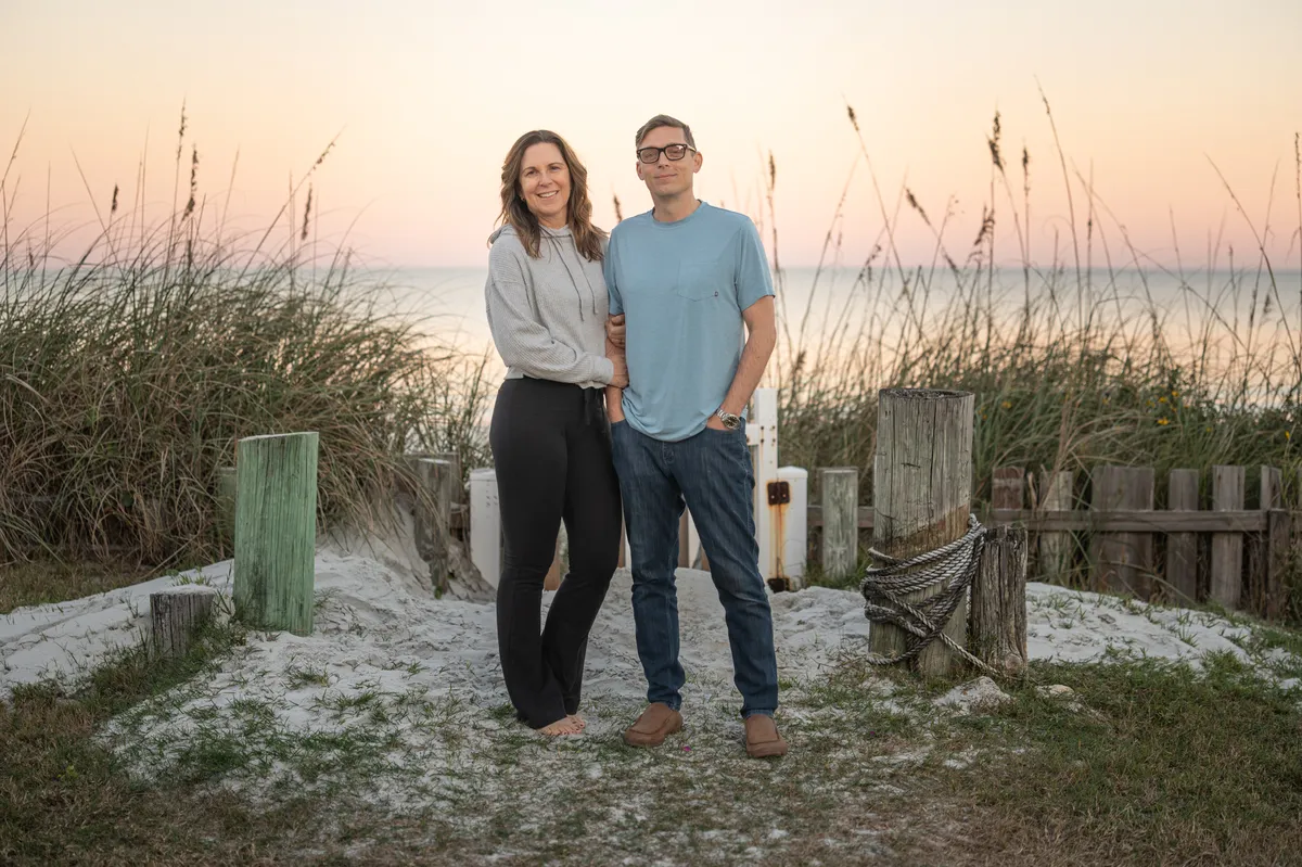 Rob and Jill Futrell at the beach at sunset